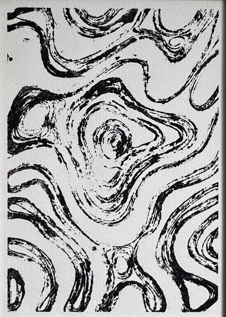 Motif de veines noires sur papier blanc, comme un marbre